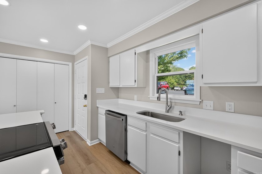 Enjoy effortless lakefront living in this beautifully remodeled - photo 5