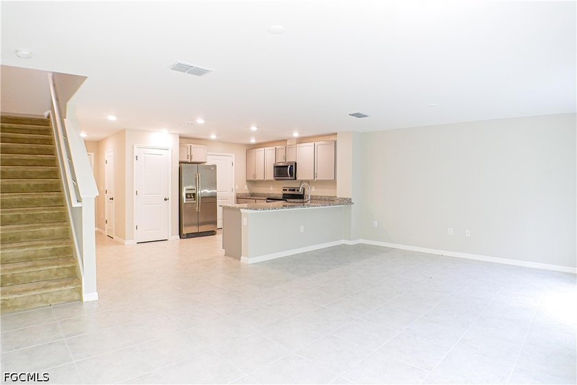 This 1,286-square-foot townhouse at 6340 Brant Bay Blvd #104 was - photo 4