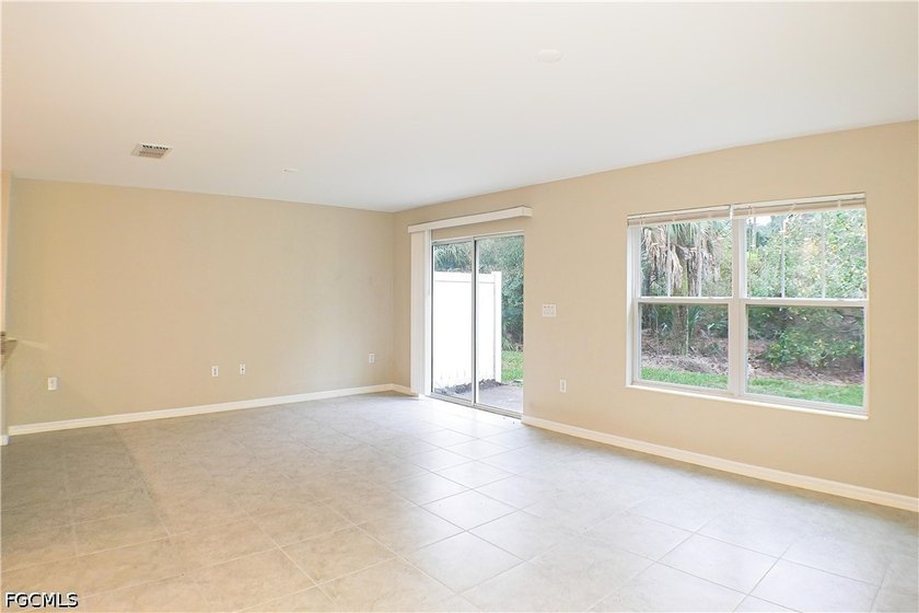 This 1,286-square-foot townhouse at 6340 Brant Bay Blvd #104 was - photo 5