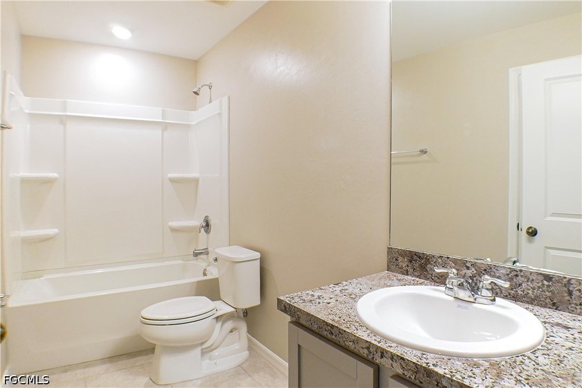 This 1,286-square-foot townhouse at 6340 Brant Bay Blvd #104 was - photo 8
