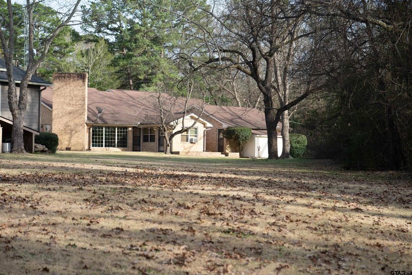 The new roof was just installed and the outside compressor unit - photo 41