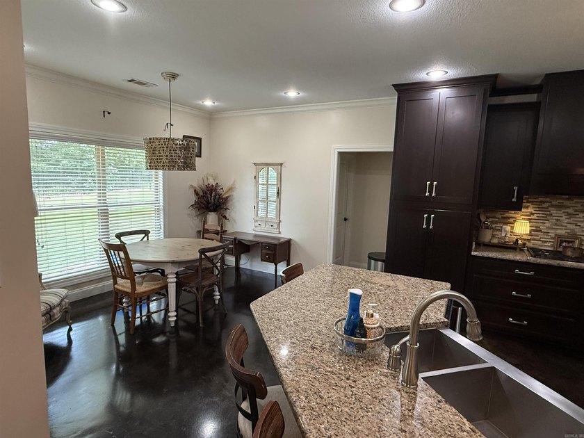 Beautiful custom built home on #15 Fairway in Sage Meadow with 5 - photo 8