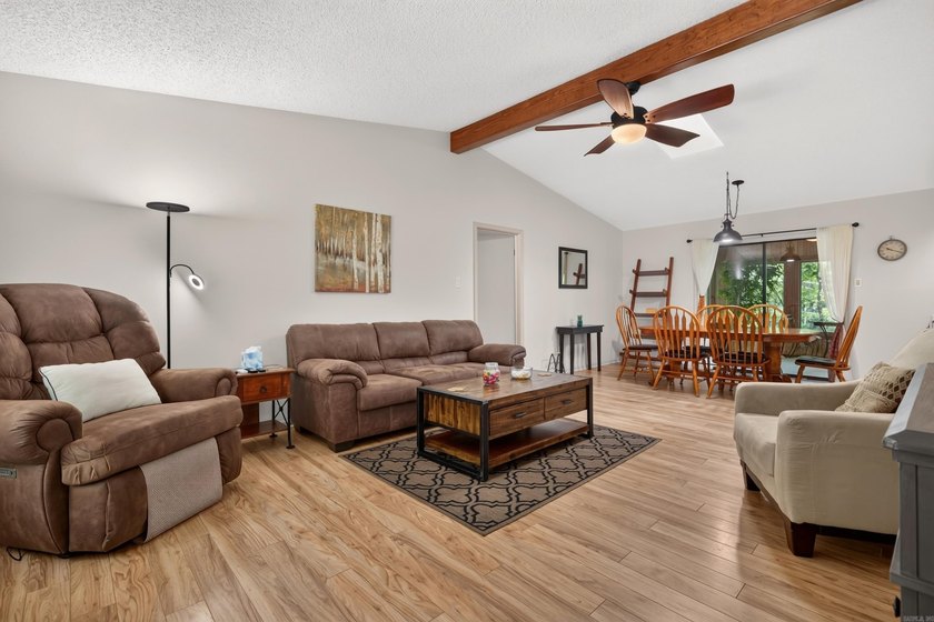 Enjoy this cute home on a private 1/3 acre lot between Lake - photo 3