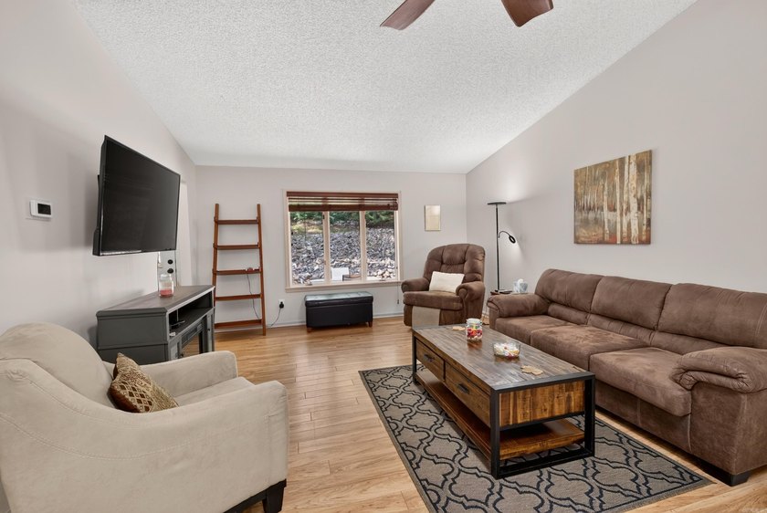 Enjoy this cute home on a private 1/3 acre lot between Lake - photo 8