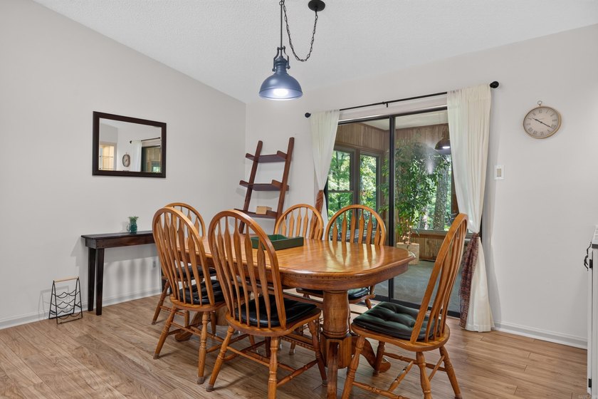 Enjoy this cute home on a private 1/3 acre lot between Lake - photo 10