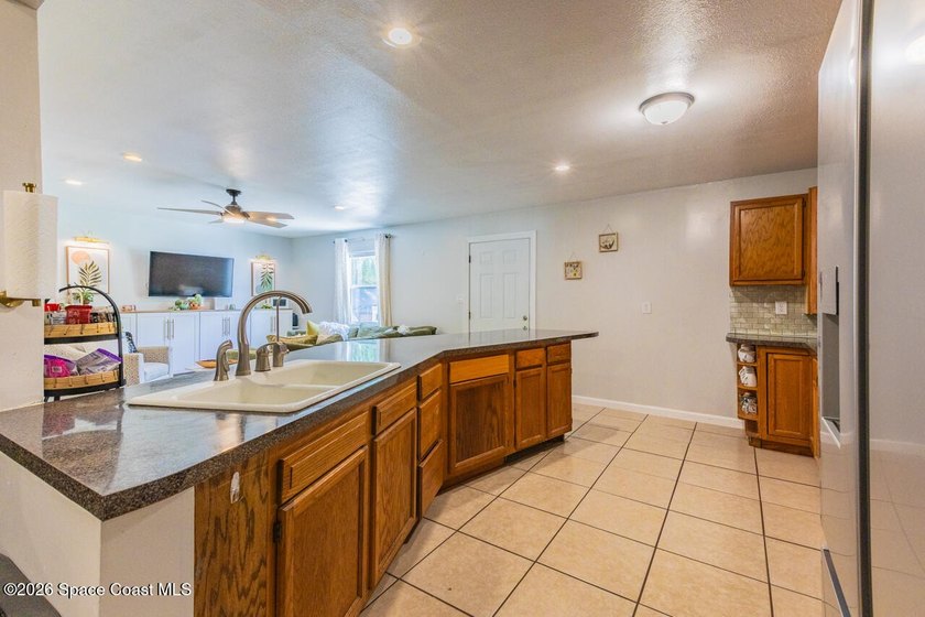 Escape the ordinary! This move-in-ready 4-bedroom, 2-bath home - photo 22