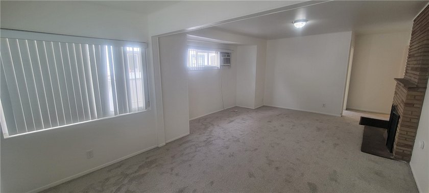 Discover the potential of this Duplex located at 411 E 8th - photo 5
