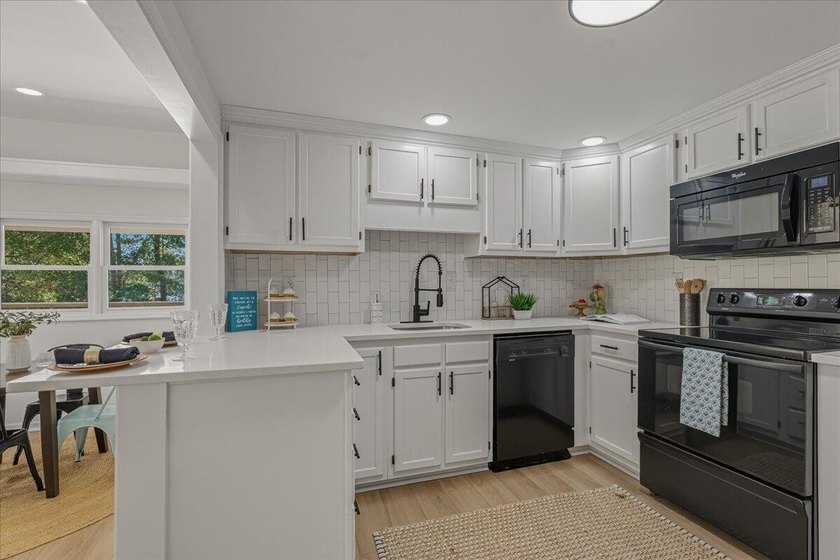 Escape to lake life in this beautifully updated one-story - photo 4