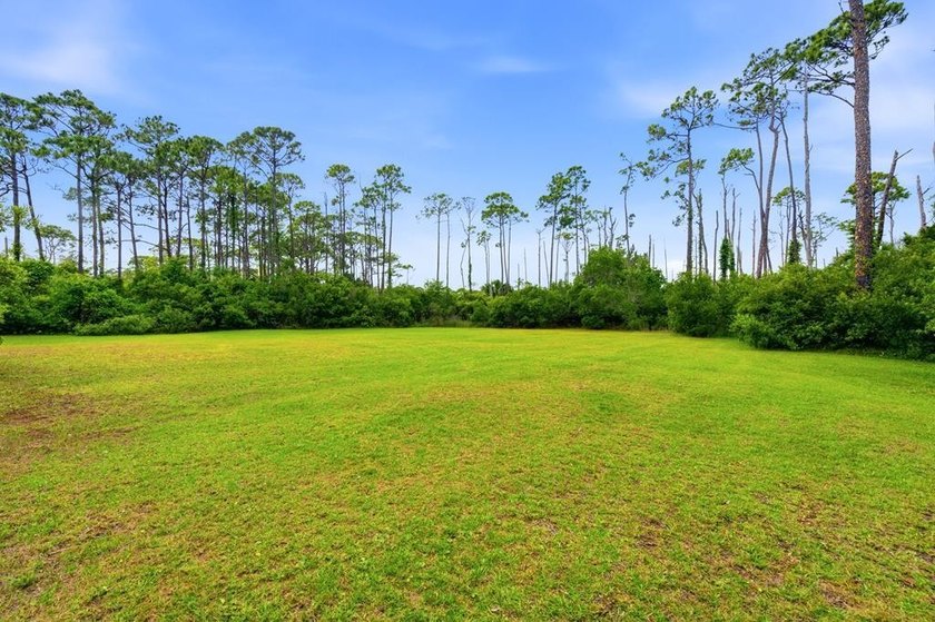 Discover a rare opportunity to own a hidden coastal gem on the - photo 2