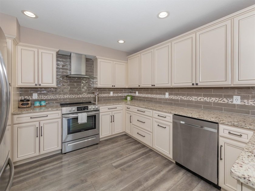 If you've been searching for a spacious townhome that lives like - photo 3