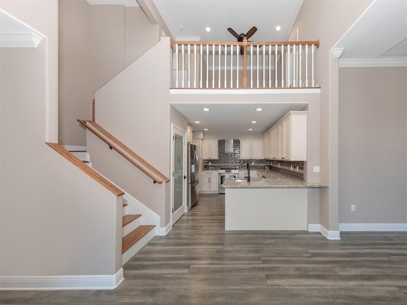 If you've been searching for a spacious townhome that lives like - photo 8