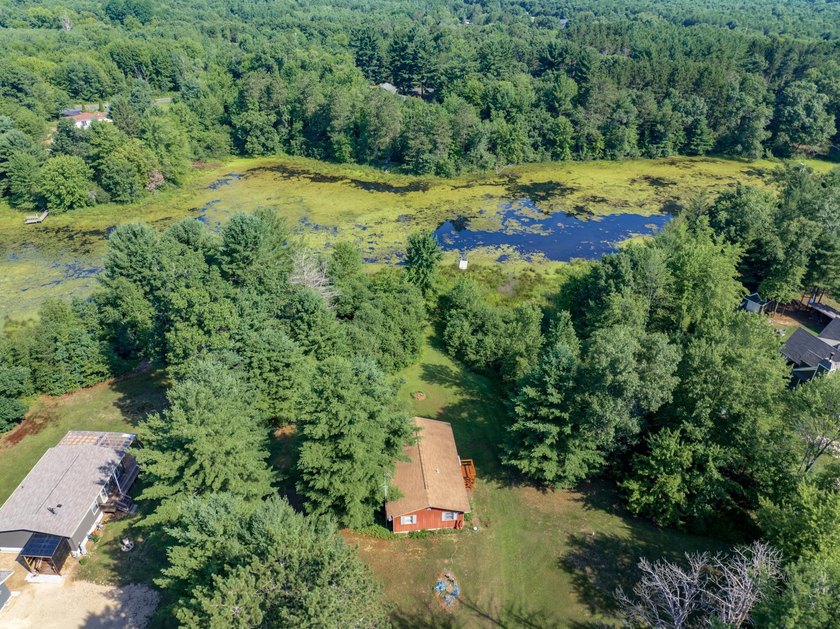 Escape to this charming Lake Front cabin, nestled on 1.7 acres - photo 2