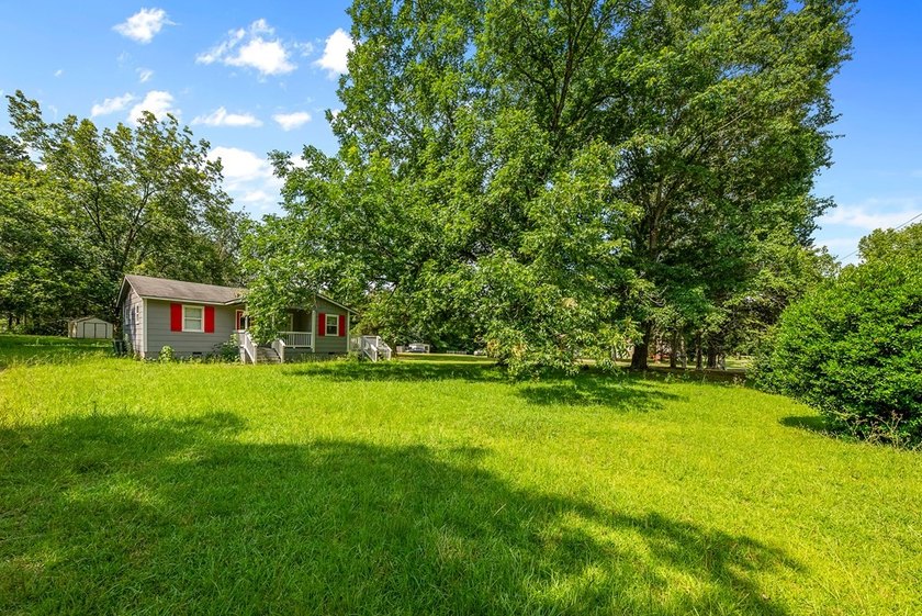 Escape to peaceful country living in this charming 3-bedroom - photo 33