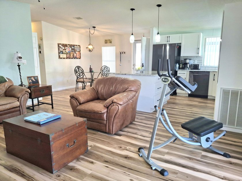 Fully furnished 2/2 home featuring a modern remodeled kitchen - photo 11