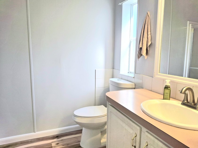 Fully furnished 2/2 home featuring a modern remodeled kitchen - photo 14