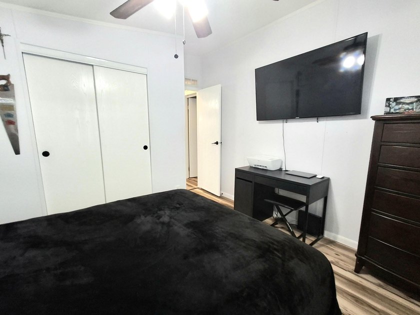 Fully furnished 2/2 home featuring a modern remodeled kitchen - photo 17
