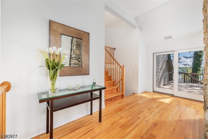 Contemporary Elegance with Stunning Lake Views. Welcome to this - photo 10