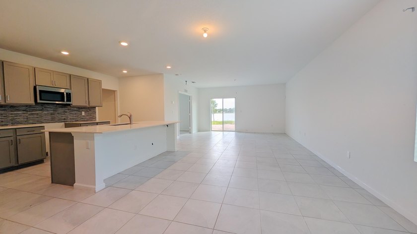 Beautifully 4-bedroom, 3 full bath home offering spacious living - photo 6