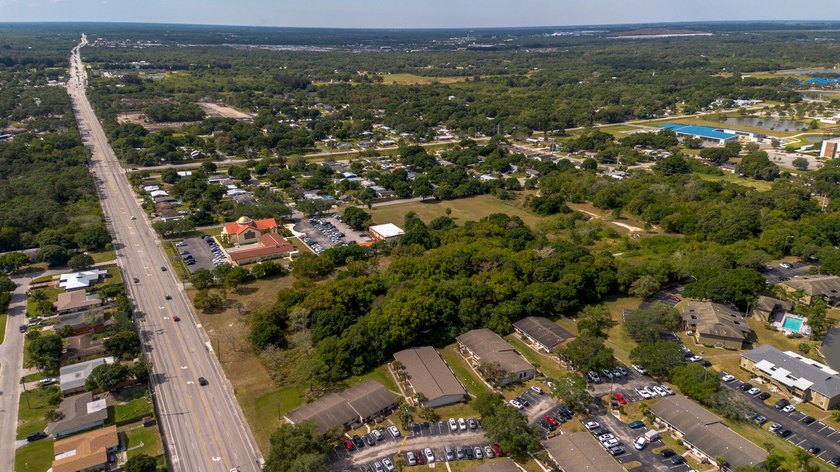 This prime 4.87-acre parcel is strategically located in a highly - photo 5