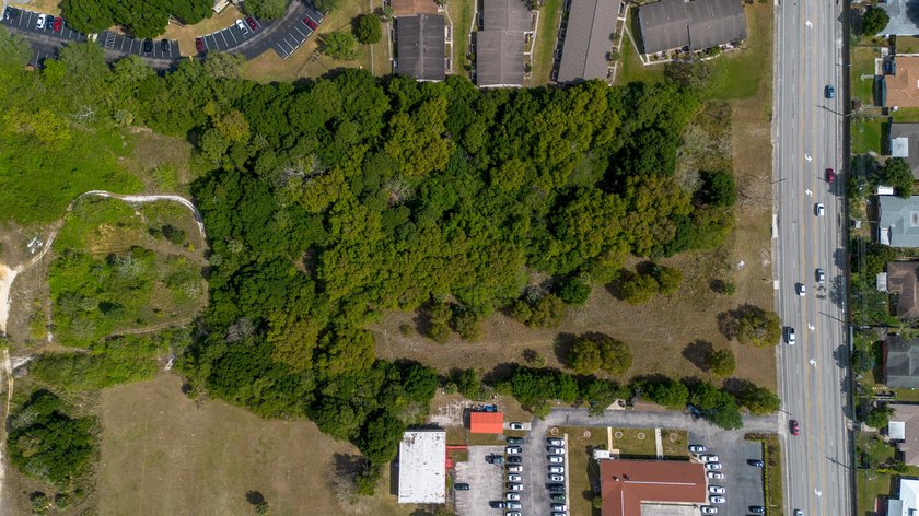 This prime 4.87-acre parcel is strategically located in a highly - photo 8