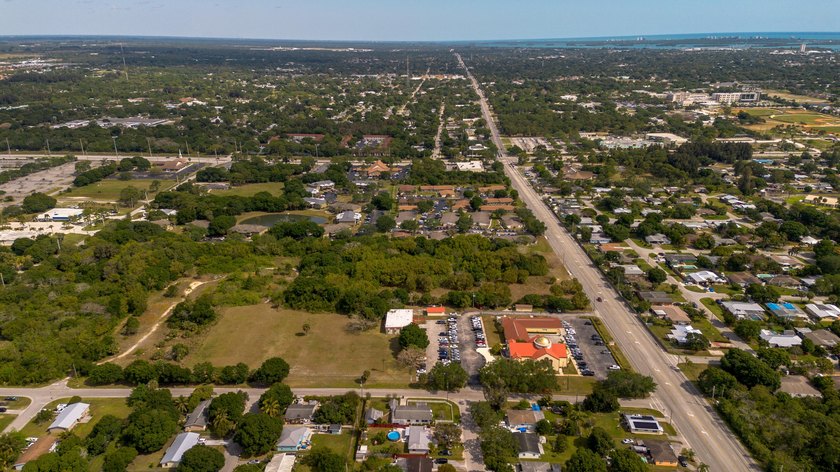 This prime 4.87-acre parcel is strategically located in a highly - photo 9