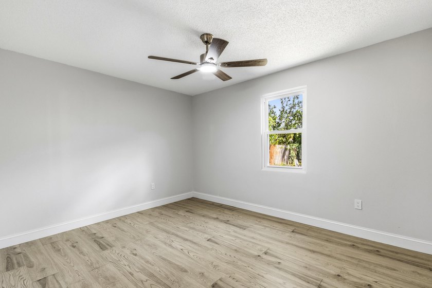 Tastefully renovated and turn-key! This stunning 3BR/2.5BA home - photo 14