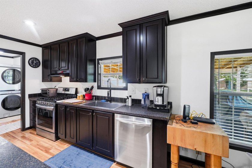 Discover the perfect blend of comfort, space, and lake living! - photo 9