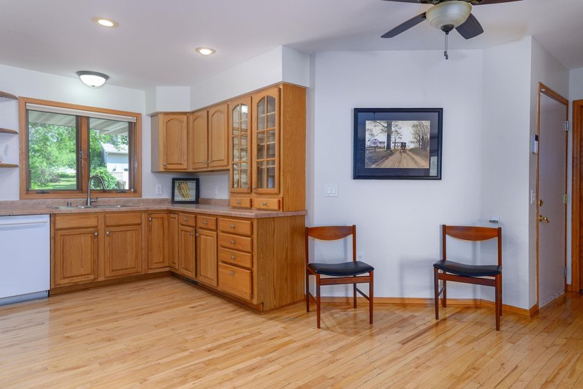 This great split-bedroom Ranch features spacious rooms, an open - photo 5