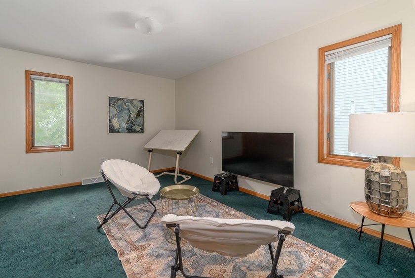 This great split-bedroom Ranch features spacious rooms, an open - photo 8