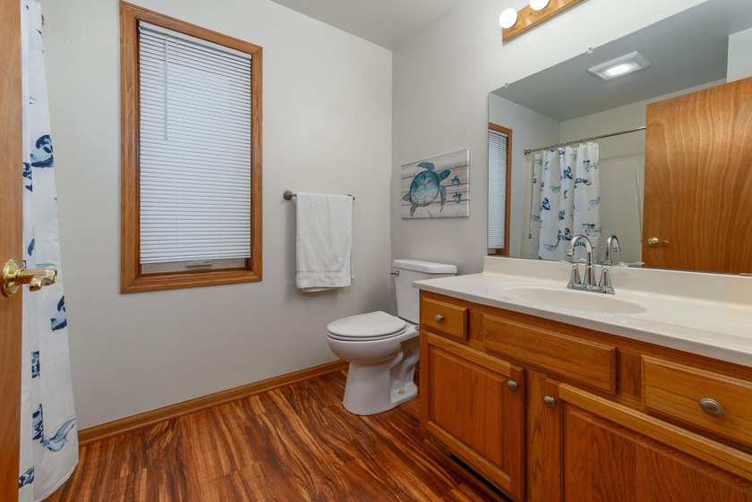 This great split-bedroom Ranch features spacious rooms, an open - photo 10