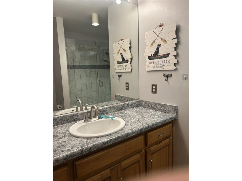 Experience ultimate lakefront living in this beautiful 4-bedroom - photo 21