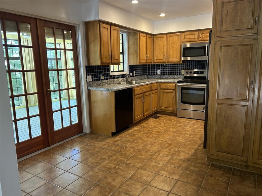 Experience ultimate lakefront living in this beautiful 4-bedroom - photo 23