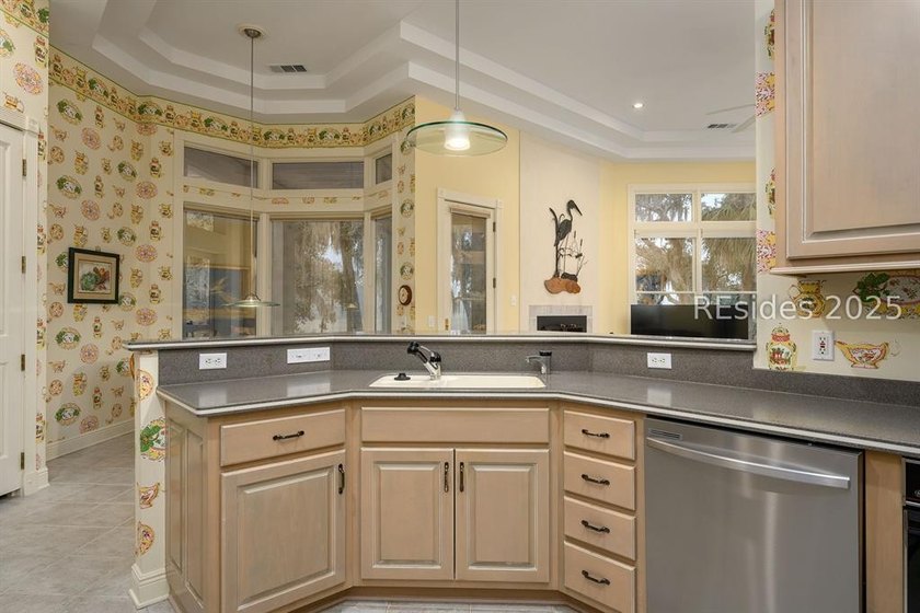 Enjoy amazing sunsets from almost every room of this marsh front - photo 25