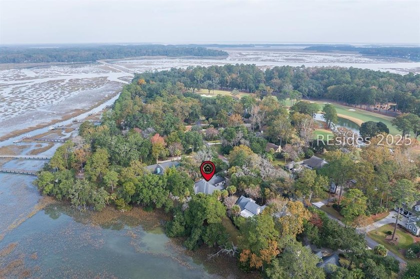 Enjoy amazing sunsets from almost every room of this marsh front - photo 46