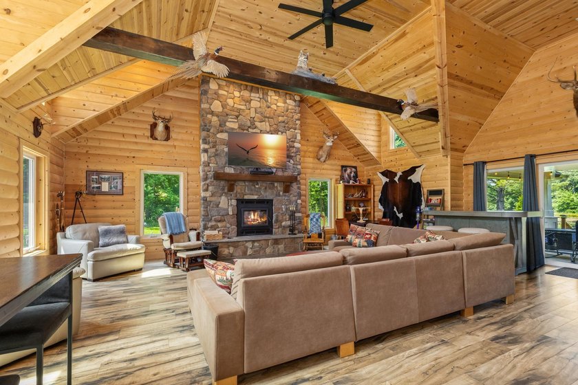 Enjoy peaceful lake living w/ 150' of frontage on private 9-acre - photo 6