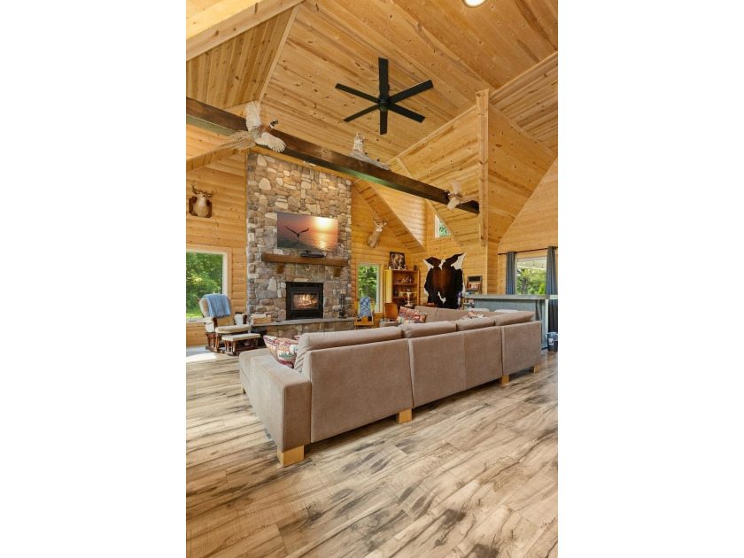 Enjoy peaceful lake living w/ 150' of frontage on private 9-acre - photo 8