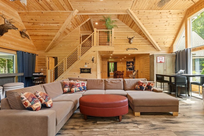 Enjoy peaceful lake living w/ 150' of frontage on private 9-acre - photo 9