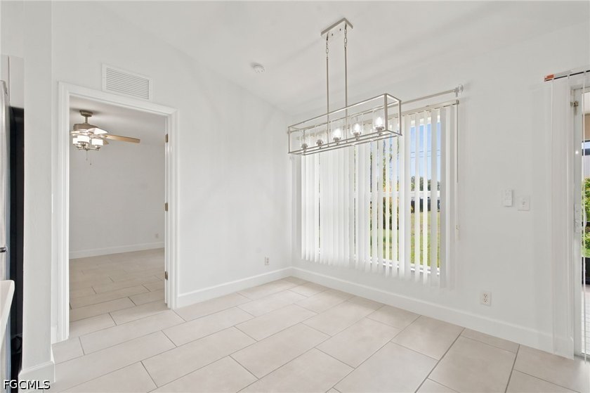 Beautifully updated 3-bedroom + den, 2-bath home offering an - photo 3