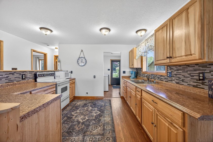 Turn-key lakefront living on Pleasant Lake! This beautifully - photo 9