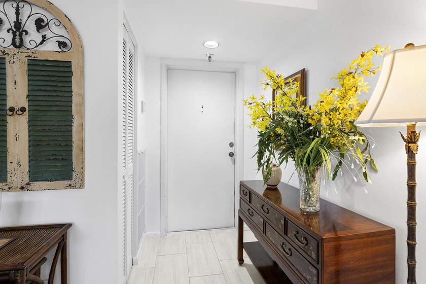 Welcome to this exceptional garden apartment, a rare find with - photo 3