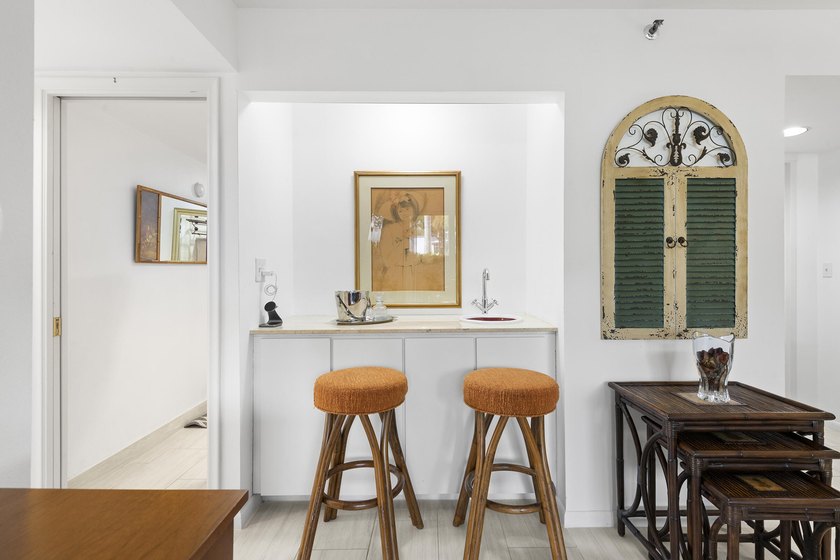Welcome to this exceptional garden apartment, a rare find with - photo 8