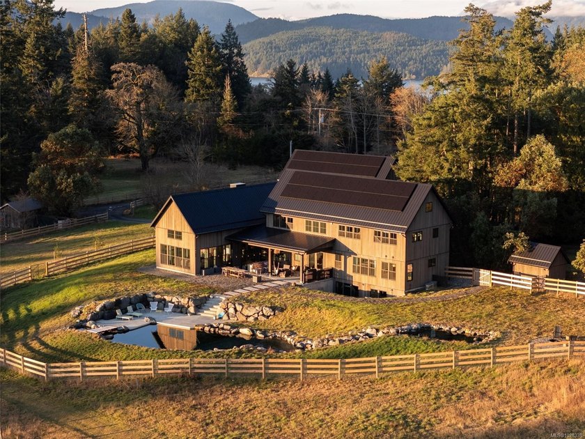 Set on five private acres along prestigious Cherry Point Road in - photo 3