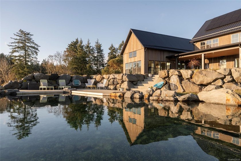 Set on five private acres along prestigious Cherry Point Road in - photo 4