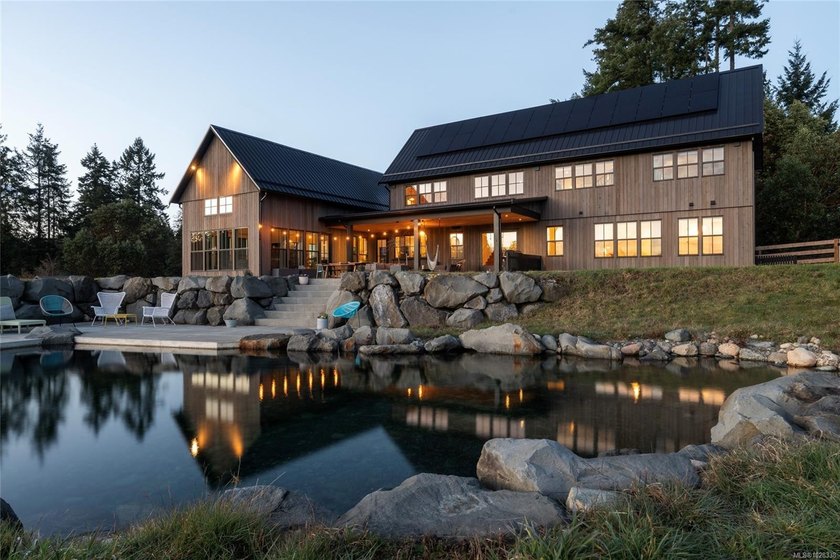 Set on five private acres along prestigious Cherry Point Road in - photo 5