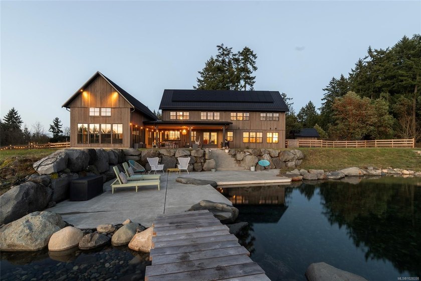 Set on five private acres along prestigious Cherry Point Road in - photo 6