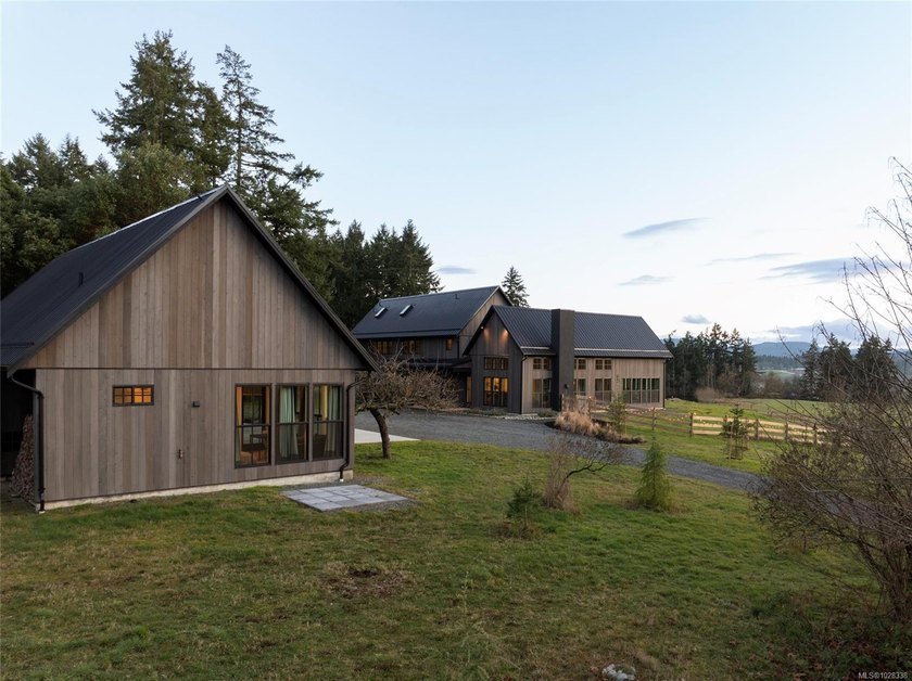 Set on five private acres along prestigious Cherry Point Road in - photo 8