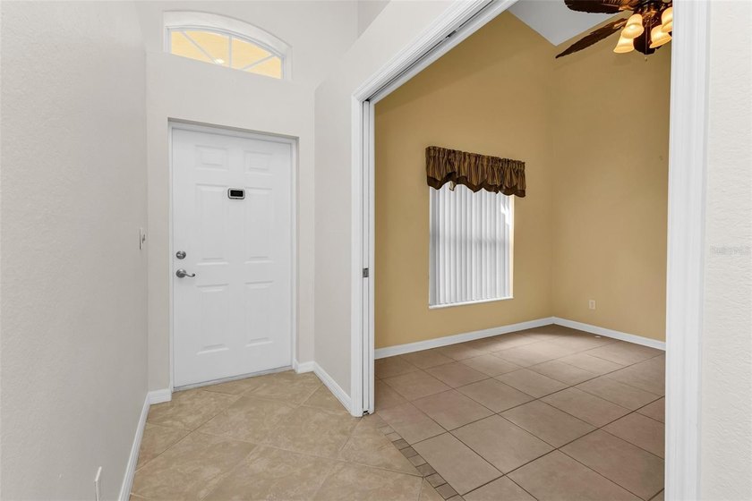 Welcome to this bright, airy, and impeccably maintained home - photo 5