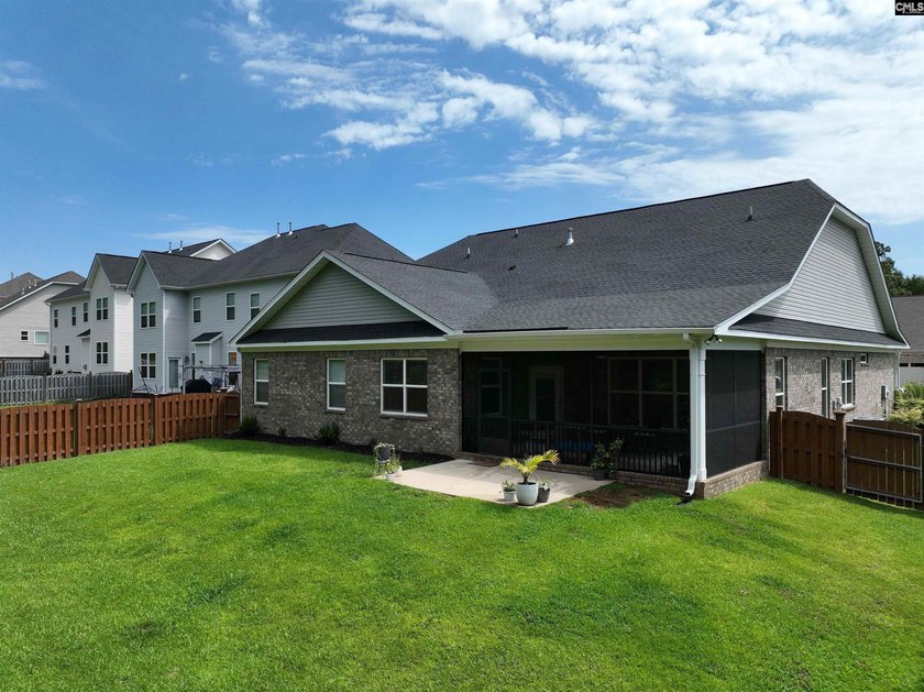 Welcome home to this beautiful all-brick ranch located in the - photo 2