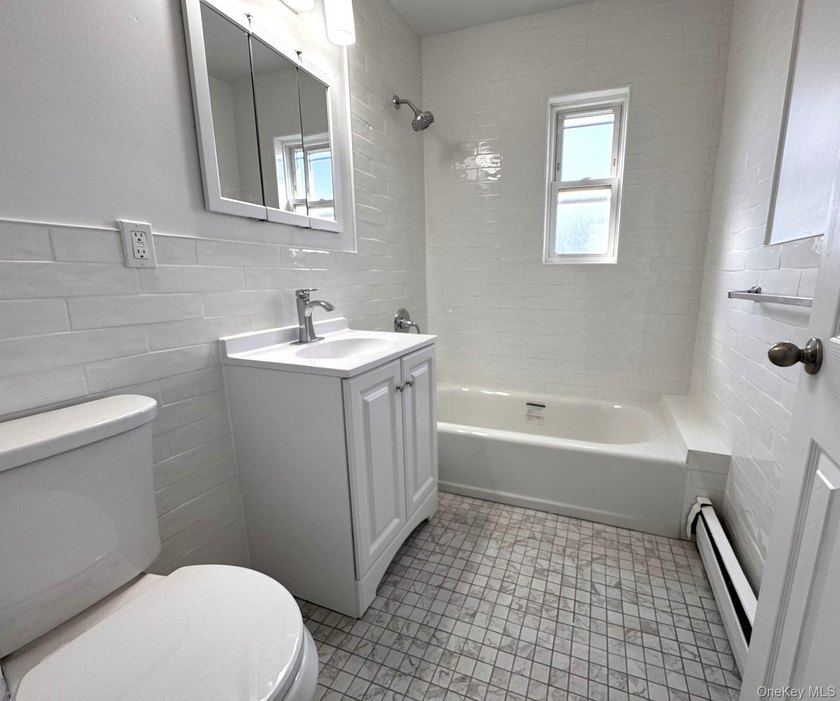 Beautifully updated two-family home in the Morris Park section - photo 14