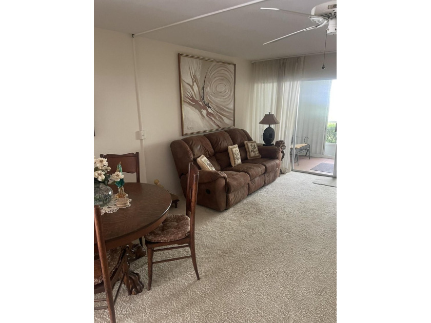 Charming first-floor condo. Step inside to find a spacious - photo 5